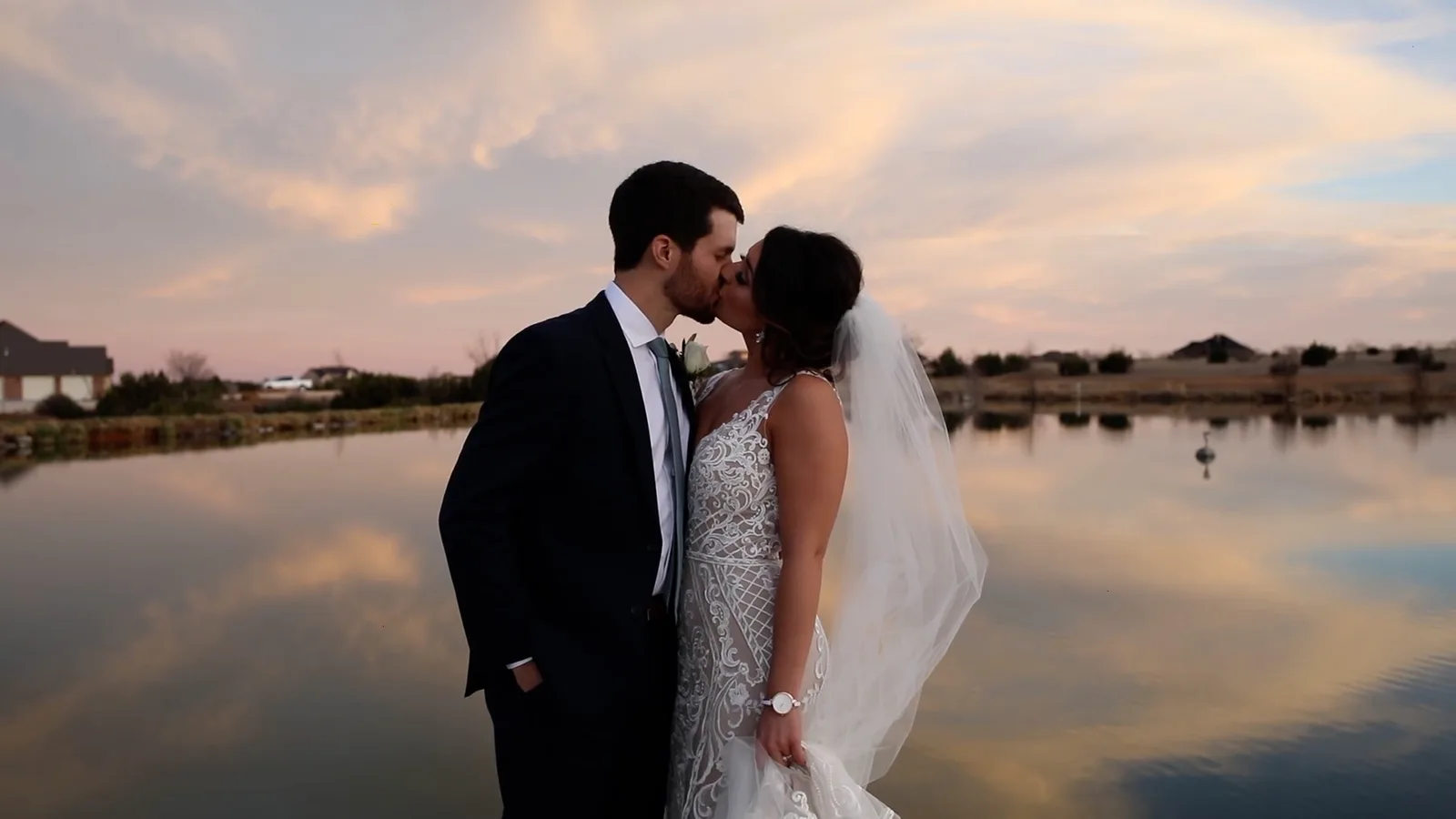 Couple at sunset lake